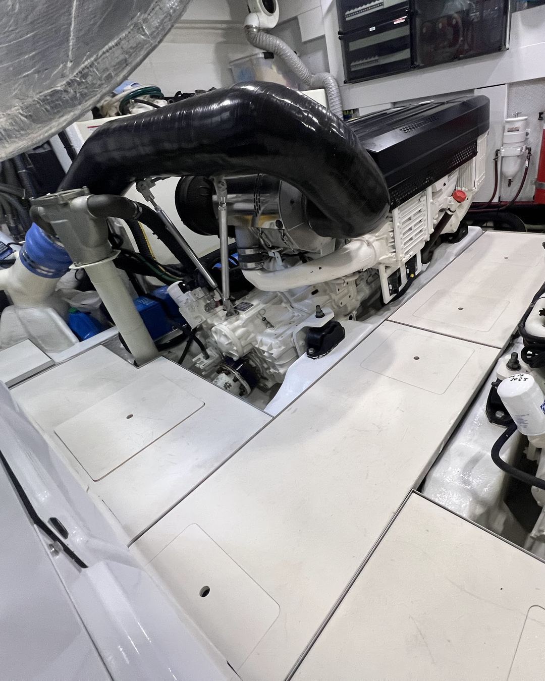 Twin diesel engines in an open engine compartment, from the shop’s photos
